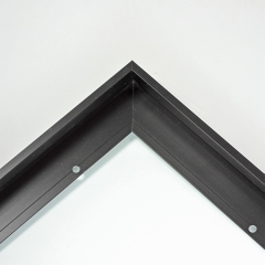 This metal canvas floater picture frame has a smooth, matte black finish and flat, narrow (.25 ") face. 

Ideal for medium to large size artwork on thin (.75 " deep) stretcher bars.  Border gallery wrapped Giclée canvas prints or paintings with this simple, modern frame for an authentic, fine art display.

*Note: These sturdy metal, custom canvas floaters are for stretched canvas prints and paintings, and raised wood panels.