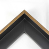 This L-shaped modern canvas floater frame, features a smooth curved wall, and a brushed gold face.     *Note: These solid wood, custom canvas floaters are for stretched canvas prints and paintings, and raised wood panels.