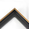 This small, L-shaped floating canvas frame in matte black features a brushed gold face.    1.5 " depth from wall, and .5 " width: ideal for medium and large canvases on thin (3/4 " deep) stretcher bars.  Pair this frame with a painting or Giclée print for an authentic fine art display.     *Note: These solid wood, custom canvas floaters are for stretched canvas prints and paintings, and raised wood panels.