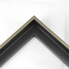 This small, L-shaped floating canvas frame in matte black features a brushed Silver face.    1.5 " depth from wall, and .5 " width: ideal for medium and large canvases on thin (3/4 " deep) stretcher bars.  Pair this frame with a painting or Giclée print for an authentic fine art display.     *Note: These solid wood, custom canvas floaters are for stretched canvas prints and paintings, and raised wood panels.