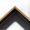 This Medium, L-shaped floating contemporary canvas frame in matte black features a thin brushed gold face.    *Note: These solid wood, custom canvas floaters are for stretched canvas prints and paintings, and raised wood panels.