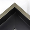 This Large, L-shaped floating contemporary canvas frame in matte black features a thin brushed silver face.    *Note: These solid wood, custom canvas floaters are for stretched canvas prints and paintings, and raised wood panels.