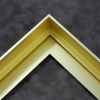 1-9/16" " stepped metal floater frame. This frame has a slim face and deep profile. It comes in yellow gold and features a horizontal brushed texture. Dispersed light is reflected.